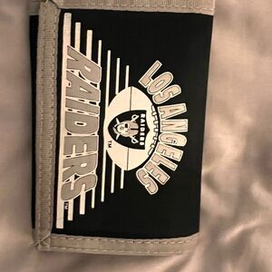 Los Angeles Raiders Velcro Wallet. (Never used).